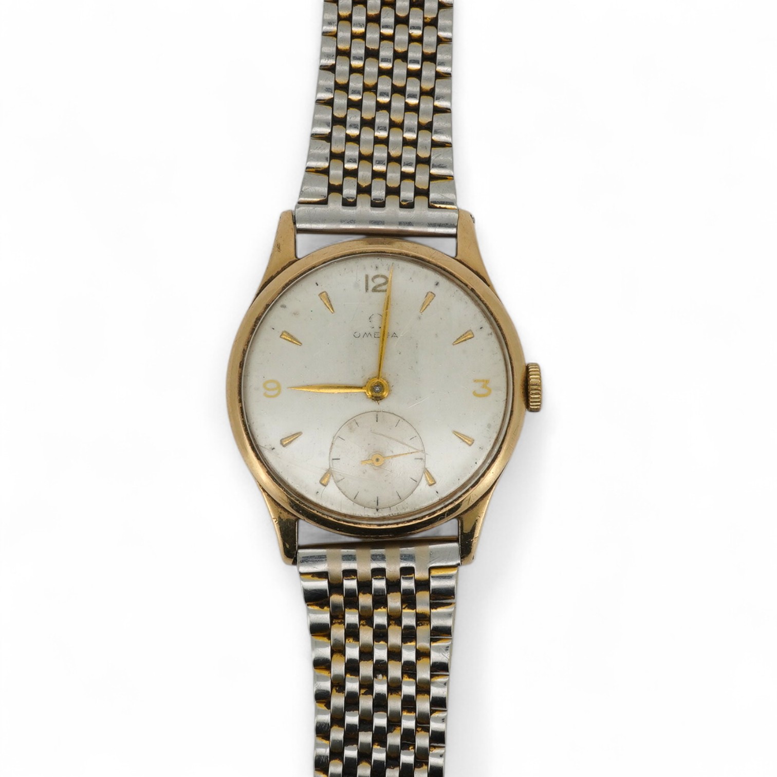 A gentleman's late 1940's 9ct gold Omega manual wind wrist watch, with baton and quarterly Arabic numerals and subsidiary seconds, movement c.265, case diameter 33mm, no logo on winding crown, on an associated stainless